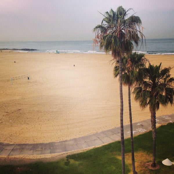 Photo taken at Venice Breeze Suites by Mona D. on 4/4/2014