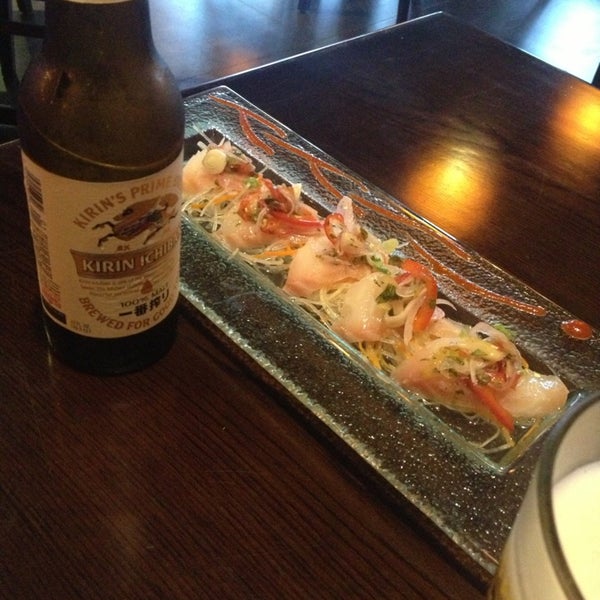 Photo taken at Takara Sushi &amp; Sake Lounge by Lester C. on 8/18/2013