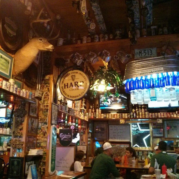 Photo taken at Duffy&#39;s Tavern by Elizabeth M. on 10/12/2014