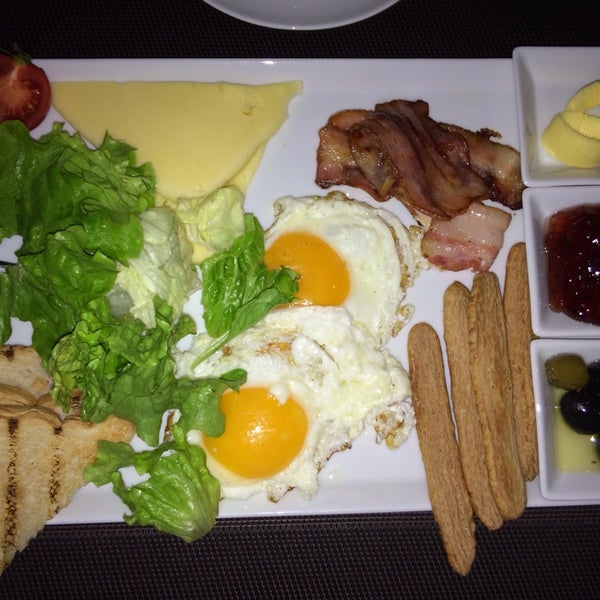 Photo taken at La Casa Tapas Bar &amp; Restaurant by Riad G. on 3/9/2014