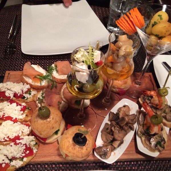 Photo taken at La Casa Tapas Bar &amp; Restaurant by Riad G. on 10/23/2014