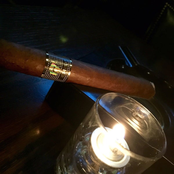 Photo taken at Merchants Cigar Bar by Jthekid3 on 6/10/2015