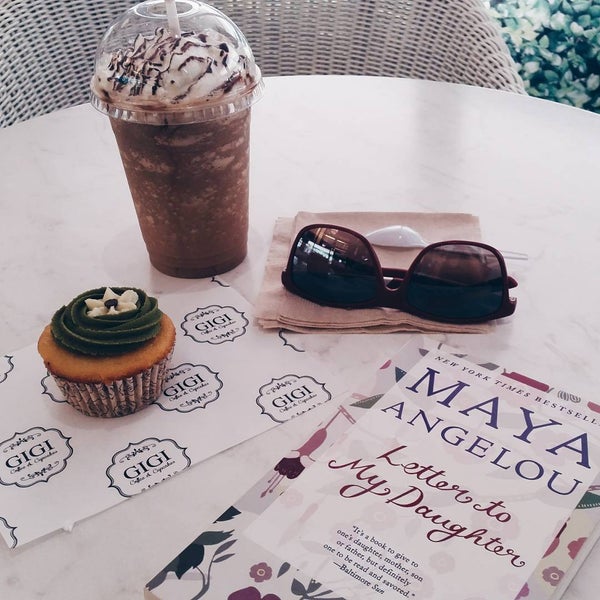 Photo taken at GIGI Coffee &amp; Cupcakes by Lou-Ann S. on 8/15/2015