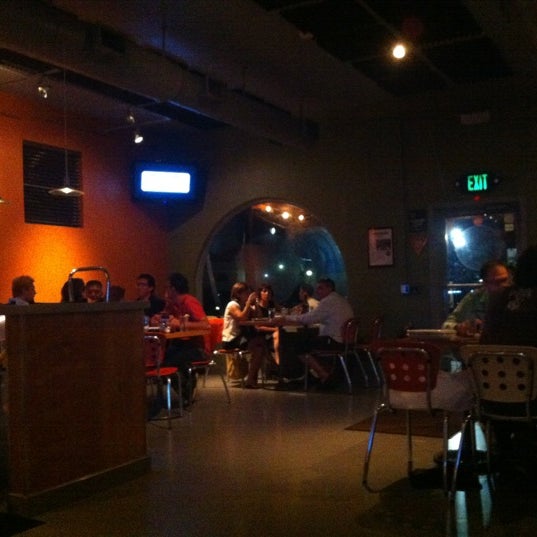 Photo taken at Tucci&#39;s Fire N Coal Pizza by April A. on 10/19/2012
