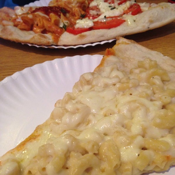 Foto diambil di Slices Pizza by Tony oleh Alaina J. pada 4/9/2014