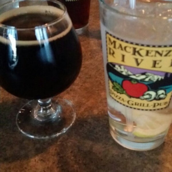 Photo taken at Mackenzie River Pizza, Grill, and Pub by John K. on 3/31/2015