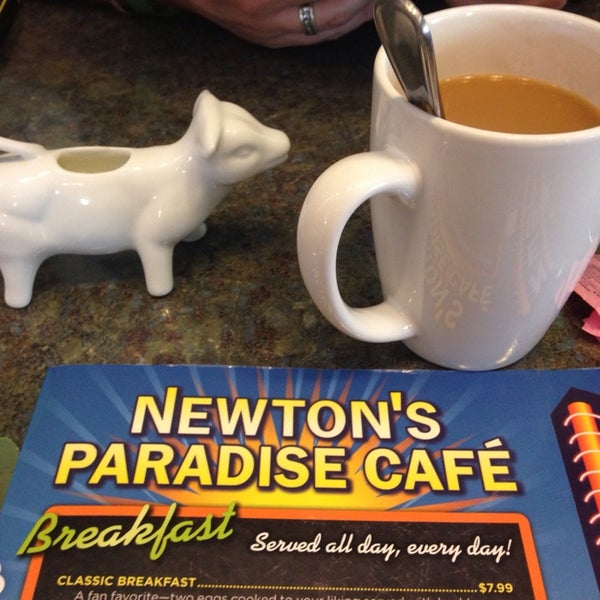 Photo taken at Newton&#39;s Paradise Cafe by Will J. on 8/2/2014