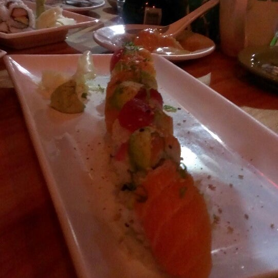 Photo taken at Blue Grotto Sushi Tapas &amp; Bar by Enid O. on 1/4/2014