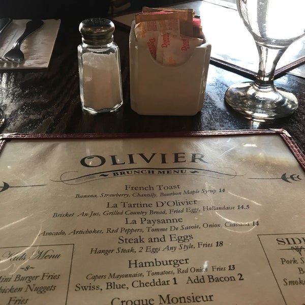 Photo taken at Olivier Bistro by Dylan S. on 2/17/2018