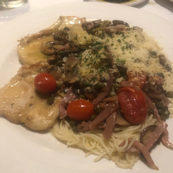 Photo taken at Romano&#39;s Macaroni Grill by Christe L. on 3/26/2019