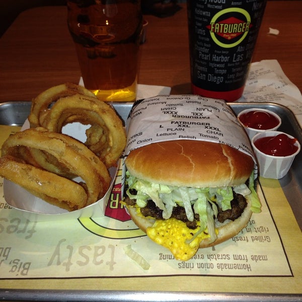 Photo taken at Fatburger by Imira D. on 1/8/2014