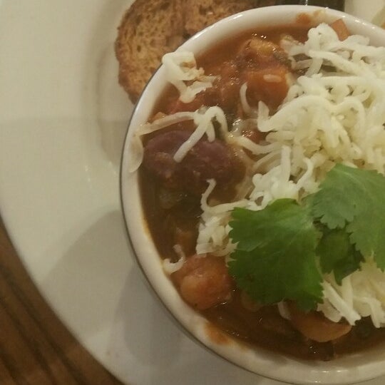 The 3 bean chili is delicious: stewed veggies rich with hearty beans and cumin spice. Can be vegan,  but I love it with melted cheese and buttery croutons.