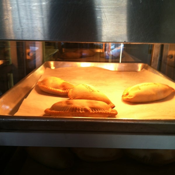 Photo taken at The Empanada Factory by Bianca R. on 2/1/2013
