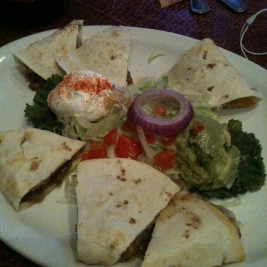 Photo taken at Enchilada&#39;s Restaurant by Chunky Monkey on 11/10/2012