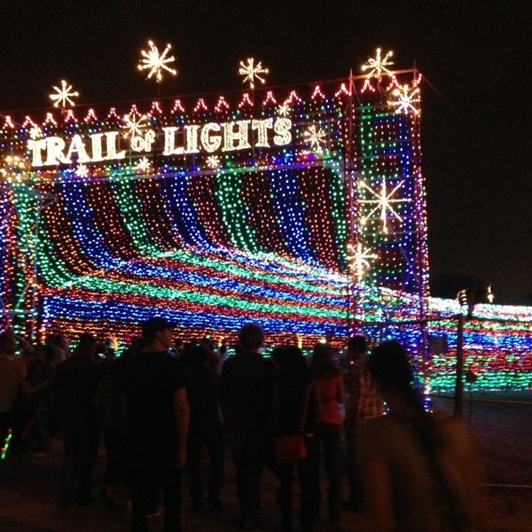 Photo taken at Austin Trail of Lights by Holly R. on 12/23/2012