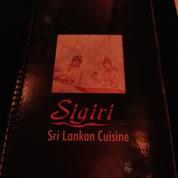 Photo taken at Sigiri Sri Lankan Cuisine by Kim M. on 1/24/2013