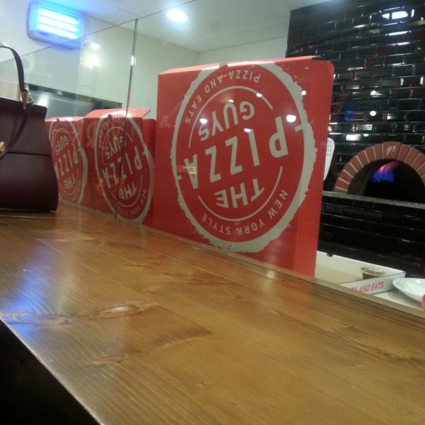 Photo taken at The Pizza Guys by Aisha A. on 12/4/2014