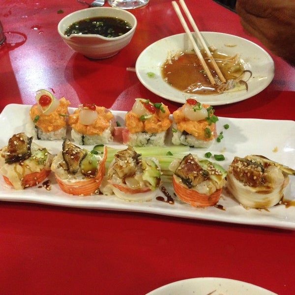Photo taken at Nura Sushi Bar by Carlos R. on 9/13/2013