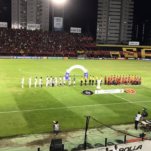 Photo taken at Estádio Adelmar da Costa Carvalho (Ilha do Retiro) by Bruno M. on 5/30/2018