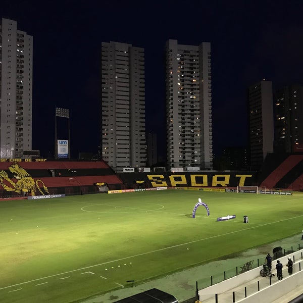 Photo taken at Estádio Adelmar da Costa Carvalho (Ilha do Retiro) by Bruno M. on 3/13/2019
