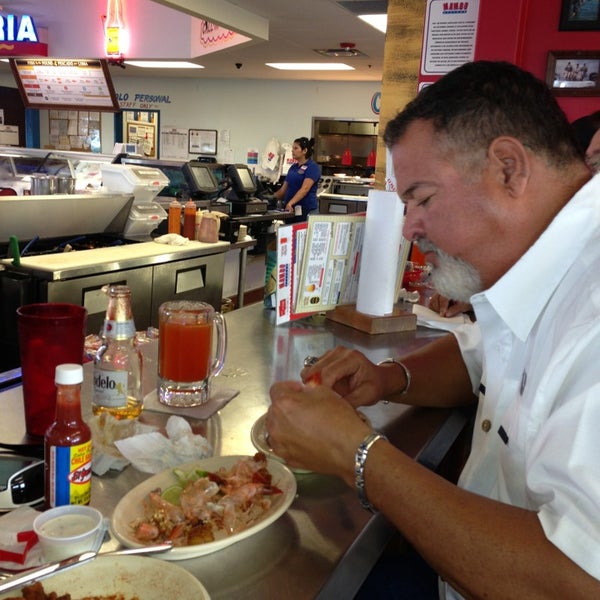 Photo taken at Mambo Seafood by Freddy P. on 8/30/2013