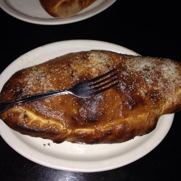 Ok...the calzone is enormous! EASILY large enough to share between two, maybe three people! But they are ABSOLUTELY fantastic!!