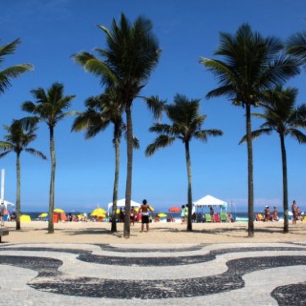 Photo taken at Copacabana Beach by Vanessa P. on 5/16/2013