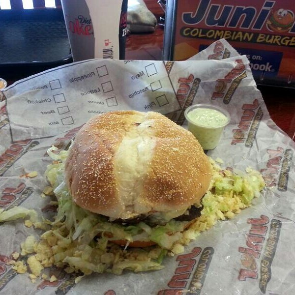 Photo taken at Junior Colombian Burger - South Trail Circle by Tom A. on 11/15/2013