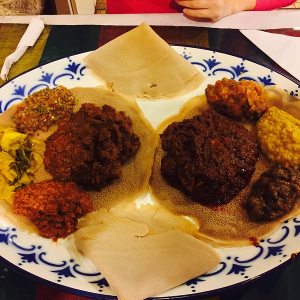 Photo taken at Aster&#39;s Ethiopian Restaurant by Hayley F. on 2/18/2015