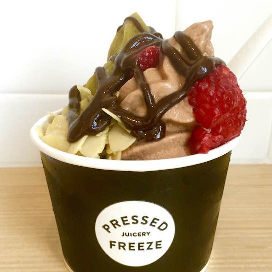 Pressed Juicery serves up their vegan frosty-textured Freeze in chocolate, vanilla, greens and fruit varieties—thought they're apparently discontinuing their citrus flavor.