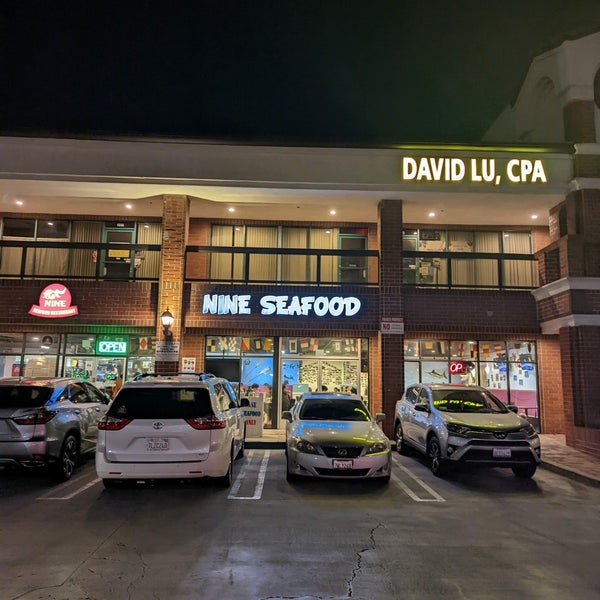 Photo taken at Nine Seafood Restaurant by Mark O. on 3/6/2022