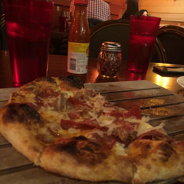 Photo taken at The Luggage Room Pizzeria by Kyle d. on 3/1/2018