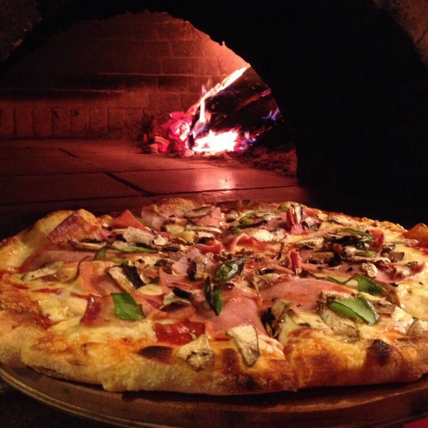 The best original Italian Pizza made in a traditional wood-fired oven! Try the Romana Pizza and the Milanese Pasta!