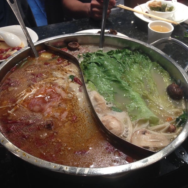 Photo taken at Happy Lamb Hot Pot, Vancouver by Yi Chen on 7/6/2014