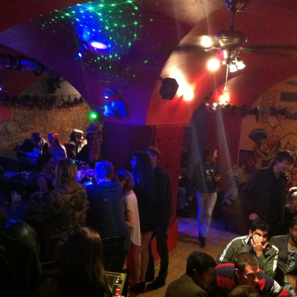 Photo taken at De Puta Madre bar &amp; cafe by Ronalds U. on 5/4/2013