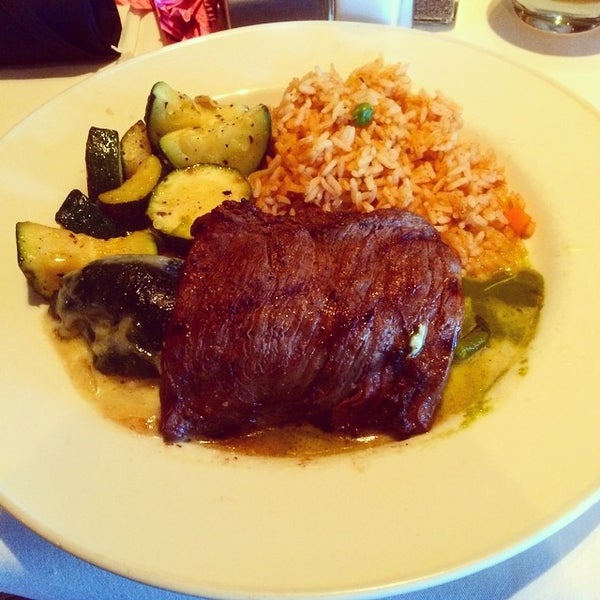 Photo taken at Cantina Laredo by Hector S. on 8/13/2014