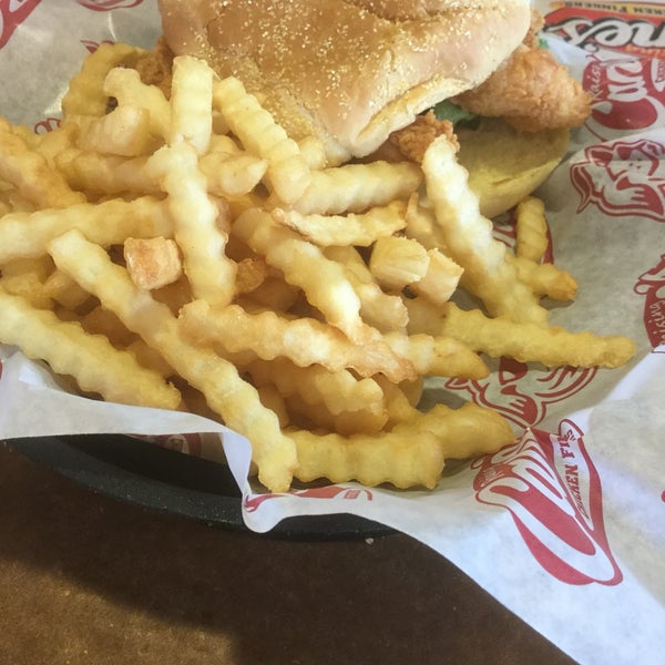 Photo taken at Raising Cane&#39;s Chicken Fingers by Momozow on 3/9/2019