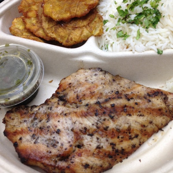 Grilled chicken with cilantro rice and tostones is the bomb. I always order this and never fails me. Their salads are good too! Pricey place but it's worth it!