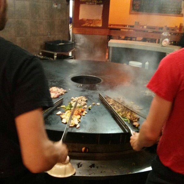 Photo taken at bd&#39;s Mongolian Grill by Craig K. on 6/29/2013