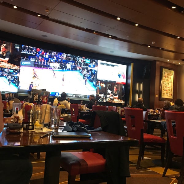 Photo taken at National Pastime Sports Bar &amp; Grill by M FahaD . on 3/24/2019