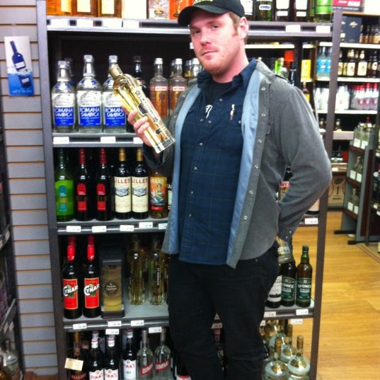 Photo taken at Grand Wine &amp; Liquors by Maria C. on 11/2/2012