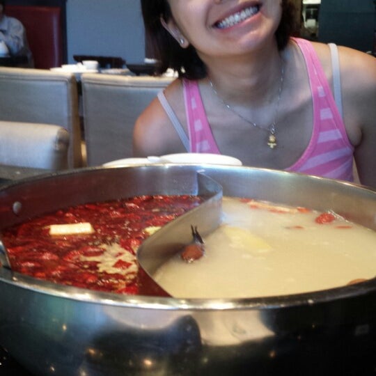 Photo taken at Happy Lamb Hot Pot, Vancouver by D L. on 7/29/2014