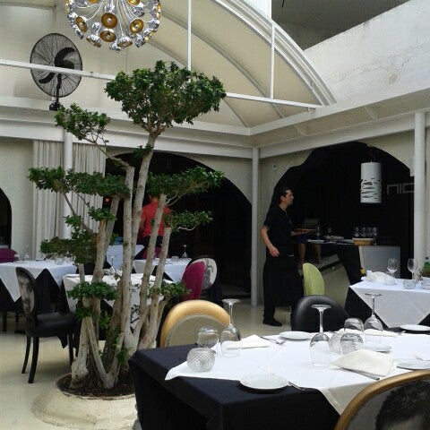 Photo taken at Nica Restaurante &amp; Lounge by Vero C. on 9/21/2013
