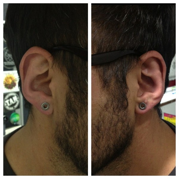 Photo taken at Pain Family Studio Tattoo &amp; Piercing by Juanjo V. on 12/29/2012