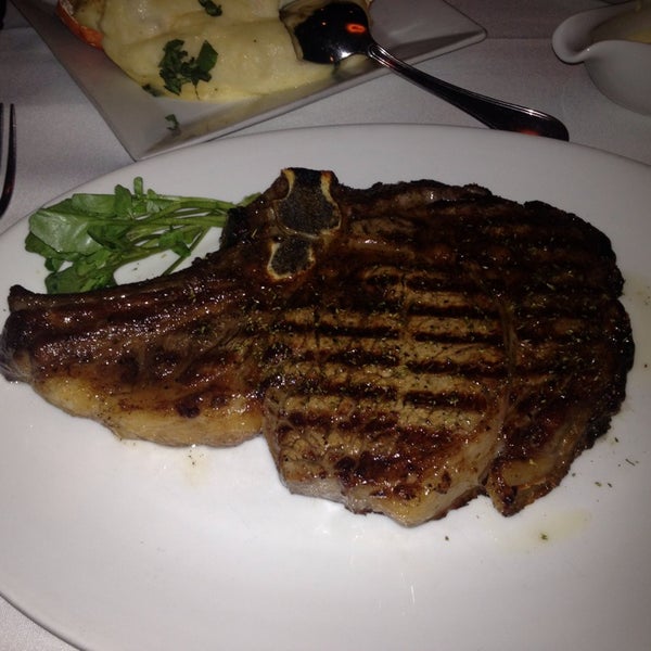 Photo taken at Christos Steakhouse by Christian D. on 9/26/2013