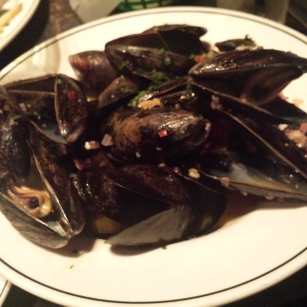 Mussels!  And great drinks. Fries are seriously over salted. Oh ...  If you're over 40 go before 9. :)