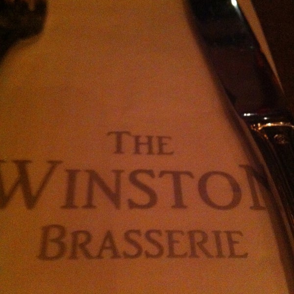 Photo taken at The Sir Winston Brasserie by Serdar K. on 4/13/2013