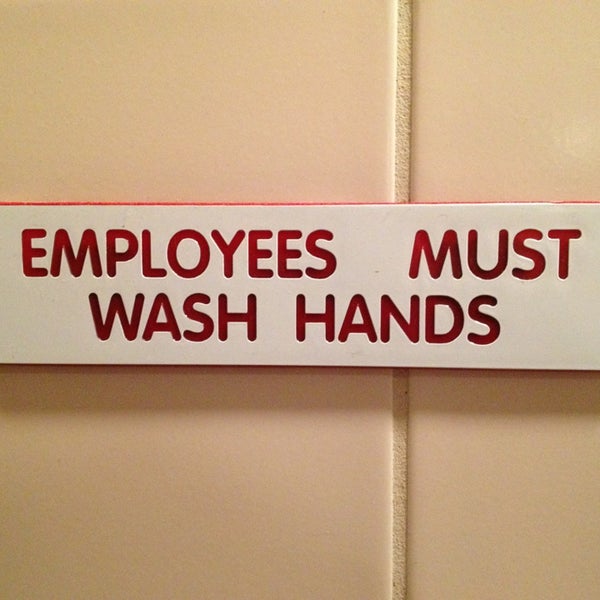 The sign lies. You'll wait 20 minutes and no employee will come to wash your hands.  Just do it yourself, you won't get in trouble.