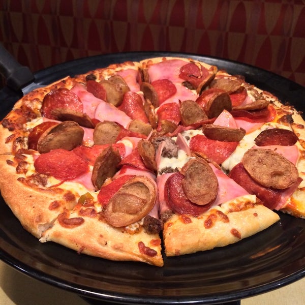 Photo taken at Boston Pizza by Richard on 1/22/2014