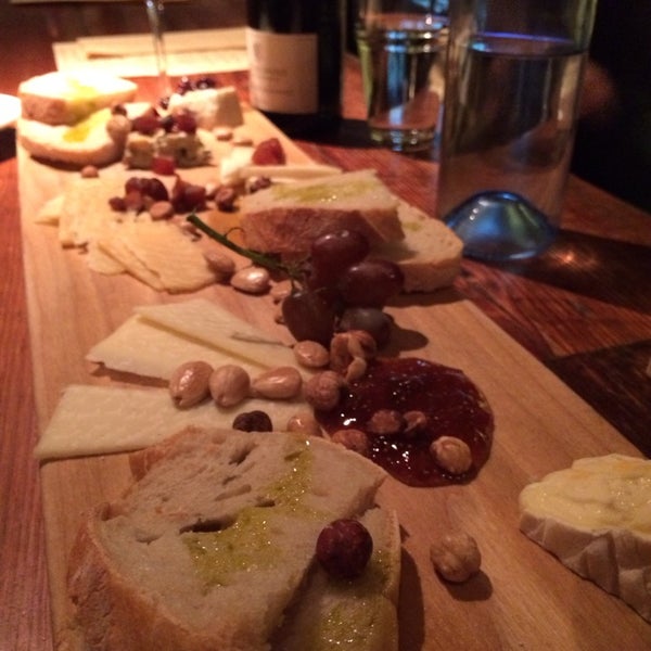 Photo taken at Salumi Tapas and Wine Bar by Lenore K. on 10/14/2013